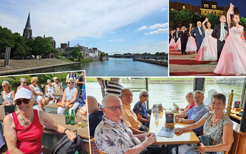 Quai de la Meuse à Maastricht, danseurs en tenue de bal et voyageurs en croisière