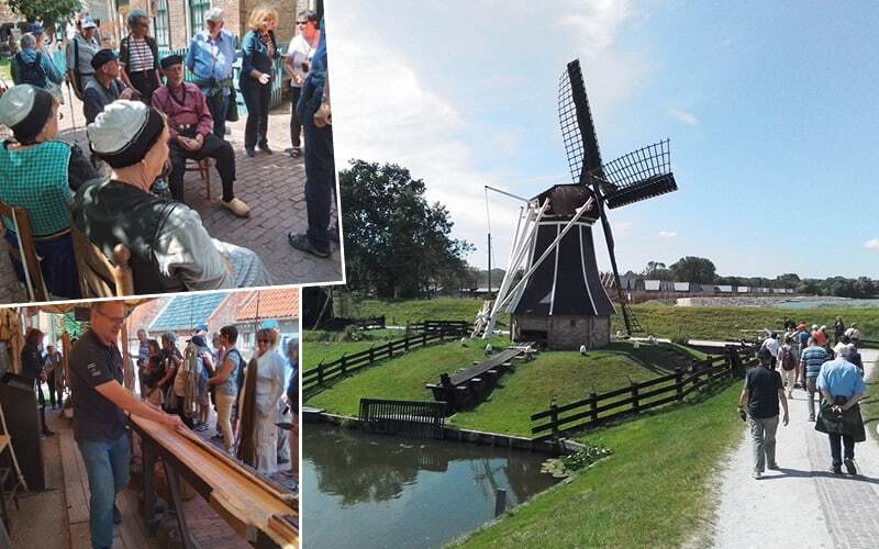 Moulin à vent au musée du Zuiderzee, démonstration d’artisanat et femmes en costume traditionnel