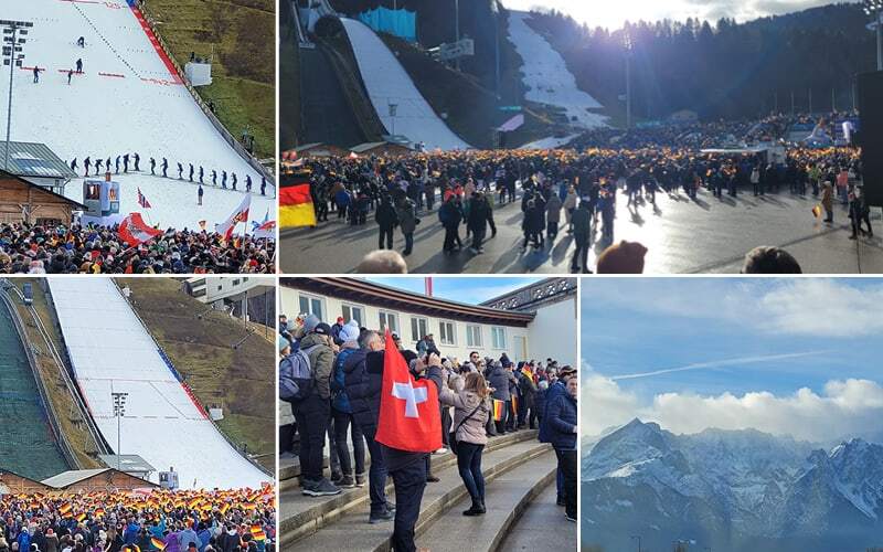 Foule au pied du tremplin de Garmisch-Partenkirchen, drapeau suisse dans le public et sommets enneigés