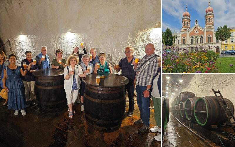 Voyageurs trinquant dans les caves de la brasserie, édifice à deux tours et fûts de bois