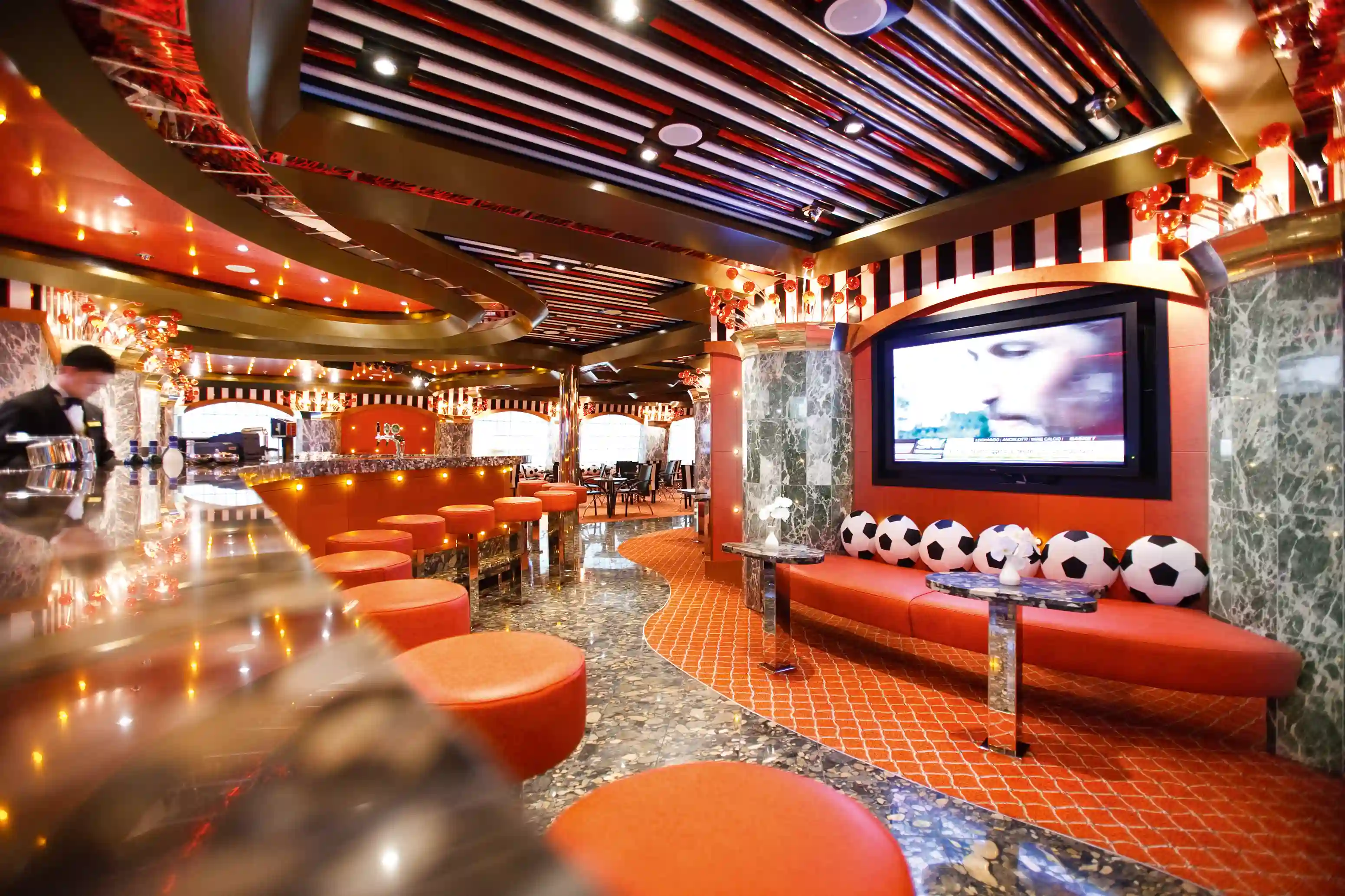 Sportbar mit Bildschirmen, Barhockern und gemütlicher Atmosphäre